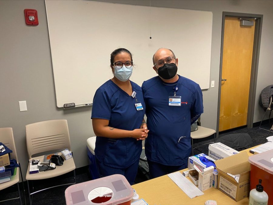 Socorro Juarez (left), a SAGE clinic staff member, and Isasias Torres, a DePaul Student Health Clinic worker, distributed 200 vaccines to DePaul students in Lincoln Park Room 315. This was double the number of flu vaccines distributed last year.