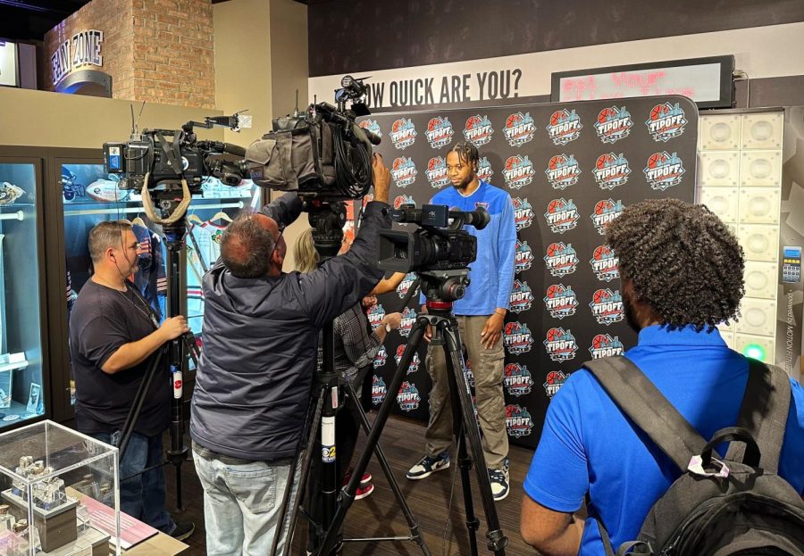 DePaul senior center Nick Ongenda gets interviewed by ABC7 news about the expectations for the Blue Demons basketball season during Thursday’s Chicagoland Media Luncheon.