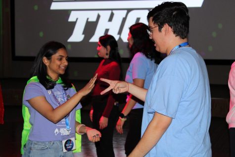 Demonthon attendees play rock paper scissors dance hyprid in recognition of children Health-Day on Oct. 1.