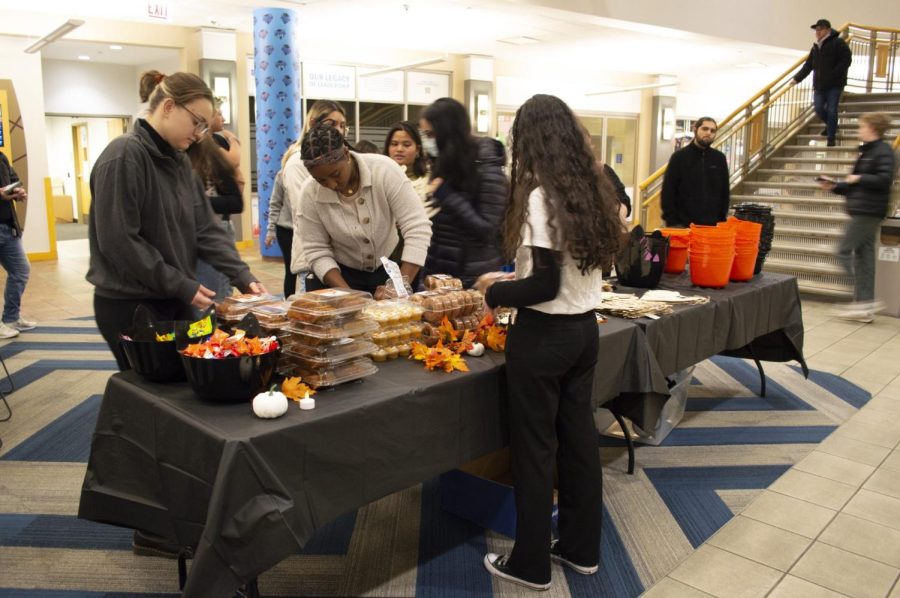 Students were able to get free donuts and candy at the Halloween party after checking into the event. After getting food, students could decorate room decor for their dorms.