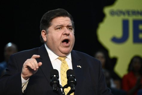Illinois Gov. J.B. Pritzker speaks during a campaign rally that Vice President Kamala Harris attended at XS Tennis and Education Foundation, Sunday, Nov. 6, 2022, in Chicago.