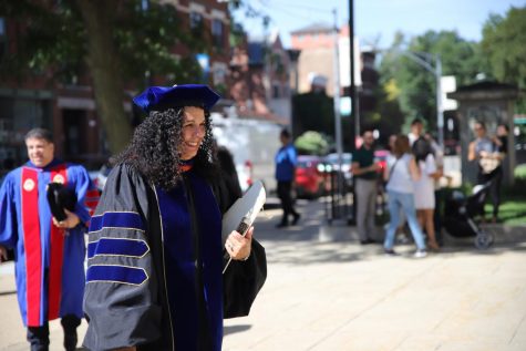 DePaul Provost Salma Ghanem walks with a group of faculty members during the introduction of the academic convocation on Sept. 1.