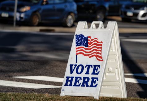 A Vote Here sign outside an election polling place at Woodbury City Hall in Woodbury, Minnesota, during the 2020 general election, on November 3, 2020.
