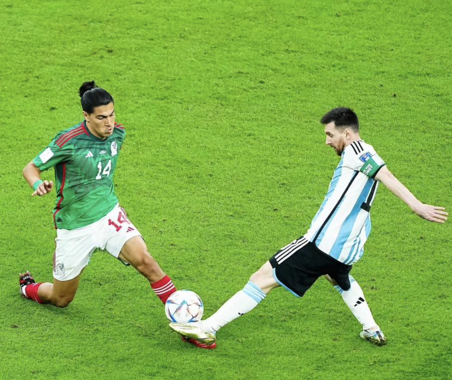 Mexico’s central midfielder Érick Gutiérrez, left, battles for possession with Argentinian forward Lionel Messi in Argentina’s 2-0 win over Mexico at the World Cup in Qatar on Saturday.