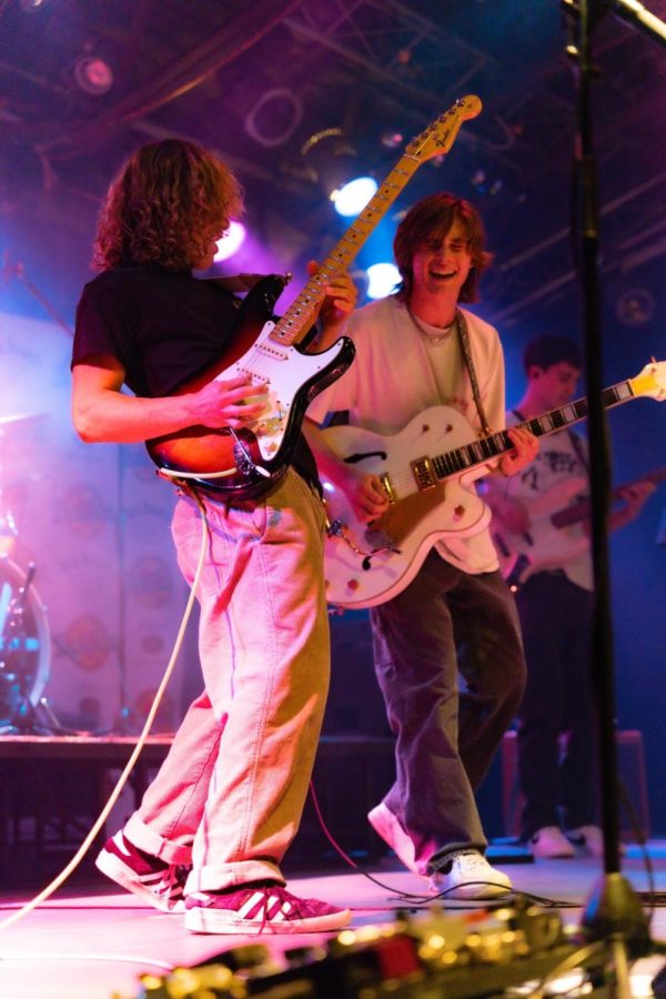 Kenny Wolzewski and Axel Ellis, the bands lead singers, are pictured mid-jam.