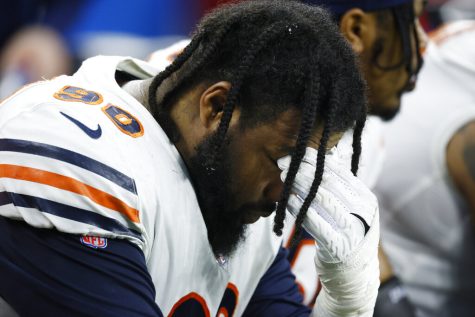 Chicago Bears defensive end Angelo Blackson sits on the bench during the second half of an NFL football game against the Detroit Lions, Sunday, Jan. 1, 2023, in Detroit. (AP Photo/Duane Burleson)