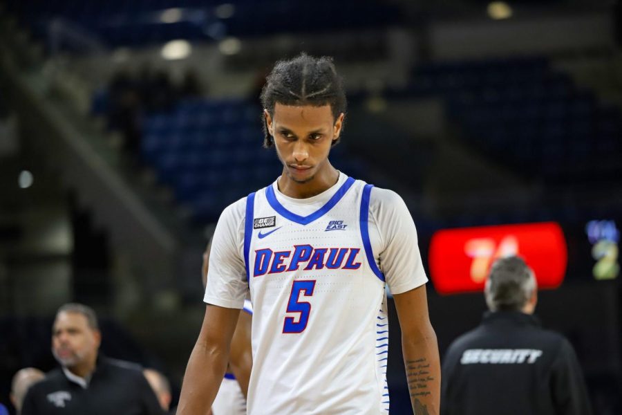 Senior guard Philmon Gebrewhit exits the court with disappointment following the final buzzer in DePauls loss to Providence on Sunday.