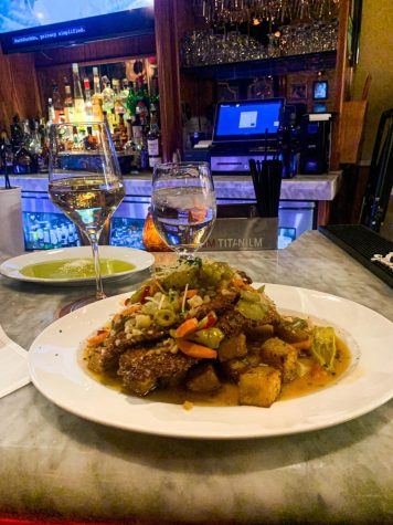 A serving of chicken giardiniera paired with roasted potatoes at Franco’s Ristorante.