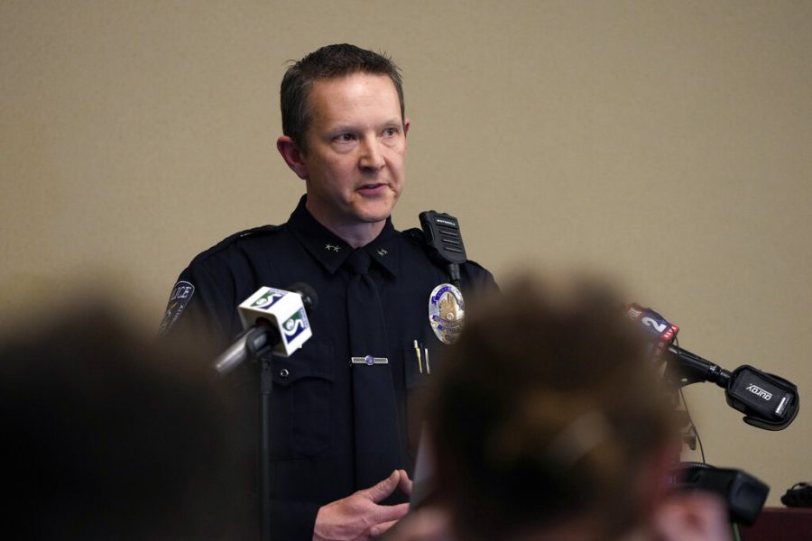 Michigan State University Interim Deputy Chief Chris Rozman addresses the media, late Monday, Feb. 13, 2023, in East Lansing, Mich. University police say multiple people have been reported injured in shootings on campus. (AP Photo/Carlos Osorio)