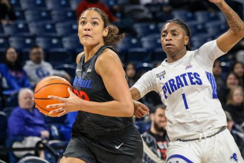 Senior guard Anaya Peoples gathers for a shot in DePauls 94-89 win over Seton Hall at Wintrust Arena Wednesday Night.