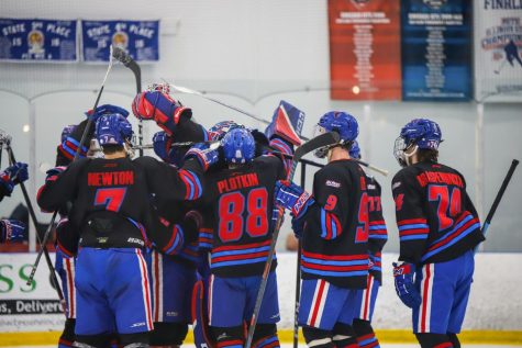DePaul celebrates after their 7-4 victory over Marian on Jan. 20. The hockey team is making its first postseason appearance since 2009.