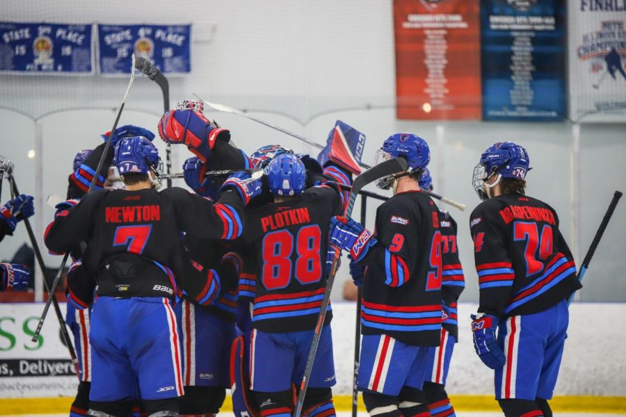 DePaul celebrates after their 7-4 victory over Marian on Jan. 20. The hockey team is making its first postseason appearance since 2009.