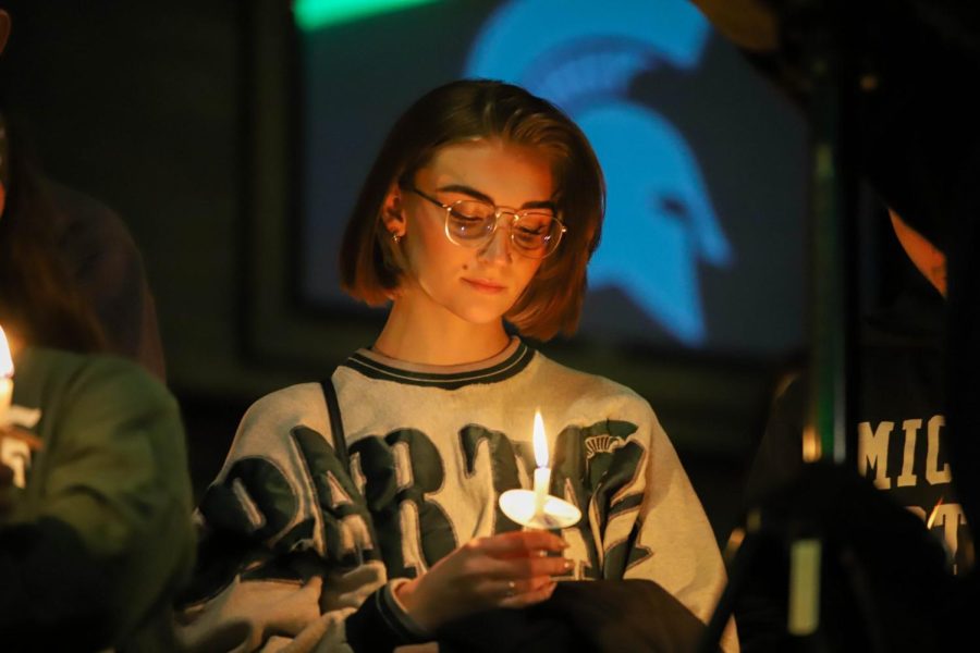A candlelight vigil was held on Feb. 18, 2023 at the Tree House bar and restaurant in River North, attended by many members and supporters of the Spartan community in Chicago.