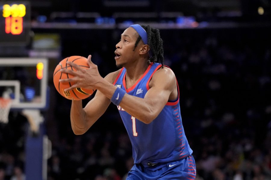 DePauls Javan Johnson (1) shoots for three points in the second half of an NCAA college basketball game against Seton Hall during the first round of the Big East conference tournament, Wednesday, March 8, 2023, in New York. (AP Photo/John Minchillo)