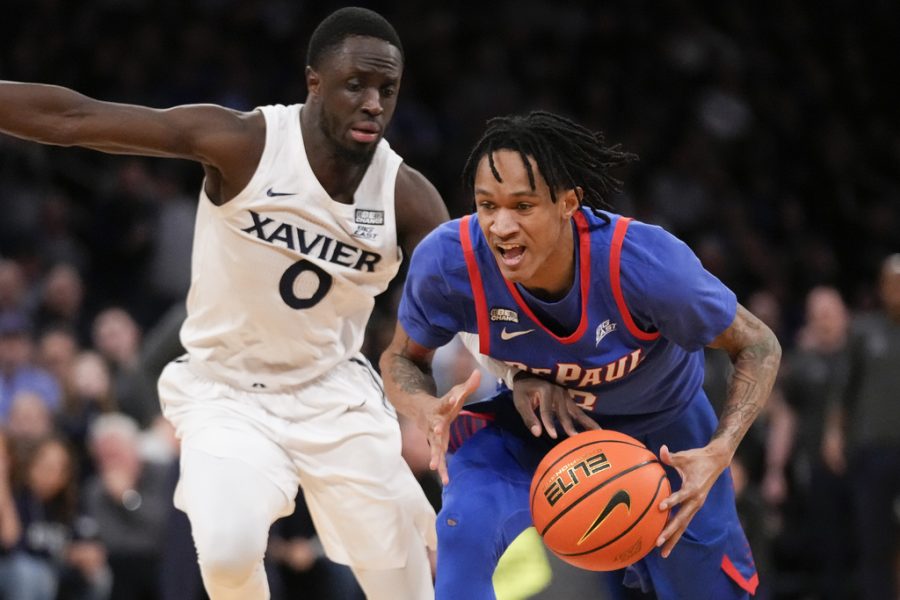 DePauls Jalen Terry (3) drives against Xaviers Souley Boum (0) in the second half of an NCAA college basketball game during the quarterfinals of the Big East conference tournament, Thursday, March 9, 2023, in New York. (AP Photo/John Minchillo)