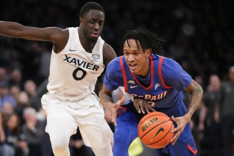 DePauls Jalen Terry (3) drives against Xaviers Souley Boum (0) in the second half of an NCAA college basketball game during the quarterfinals of the Big East conference tournament, Thursday, March 9, 2023, in New York. 