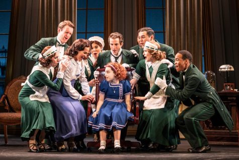 Ellie Pulsifer (center) stars as titular character Annie in the Cadillac Palace Theater performance of Annie, which runs until March 19.