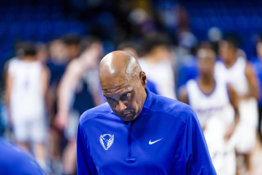 Head coach Tony Stubblefield hangs his head  after the team suffered a 90-76 loss to UConn on Jan. 31.