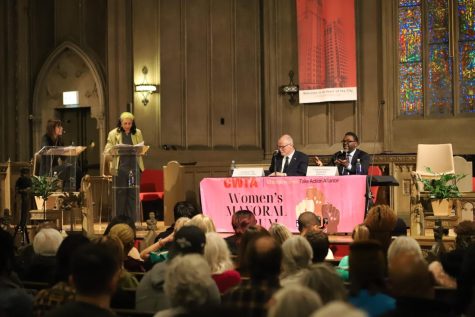 Mayoral candidates Paul Vallas and Brandon Johnson speak at the Womens Mayoral Forum, hosted by Chicago Women Take Action Alliance, on Friday, March 10.