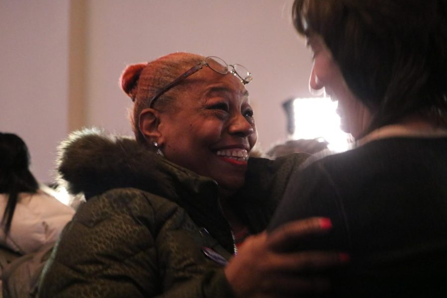 A Chicago voter celebrates after Brandon Johnson was announced as a candidate in the runoff for the 2023 mayoral election. The runoff is on April 4.