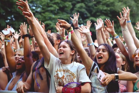 Concert-goers dance at Lollapalooza 2022 in Grant Park. Frequent festival-goers have complained that poor concert etiquette ruins the experience for all attendees, and has lead to injuries.