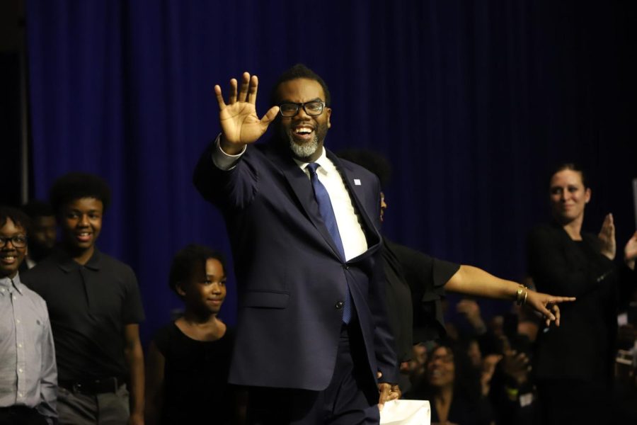 Brandon Johnson waving to supporters at victory party on April 4.