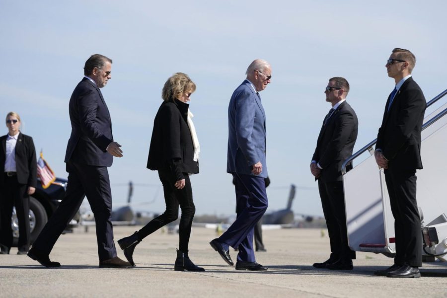 President Joe Biden walks to board Air Force One on April 11 with his son Hunter Biden, left, and sister Valerie Biden. Biden is traveling to the United Kingdom and Ireland to celebrate the Good Friday Agreement.