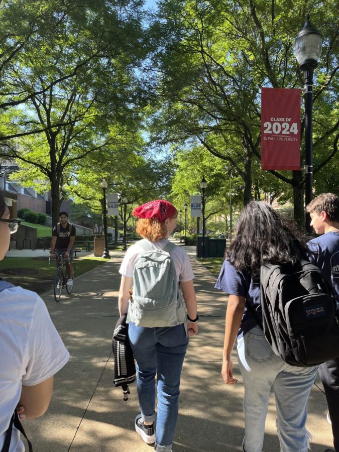 Students traverse the quad in Lincoln Park toward Belden Ave.