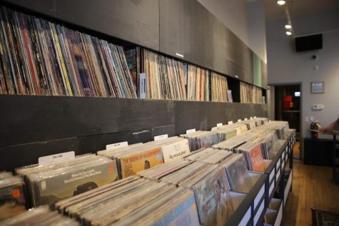 Record filled cases line the walls at Miyagi Records in Washington Park.