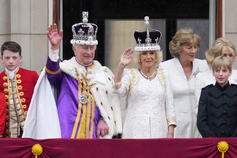 Britains King Charles III and Queen Camilla wave to the crowds from the balcony of Buckingham Palace after their coronation ceremony, in London, Saturday, May 6, 2023. 