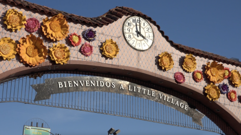 The Little Village entry arch on 26th St. The gate is the first landmark many migrants, who are coming into the city, see when they are welcomed into the neighborhood.
