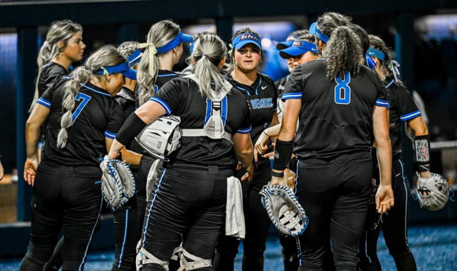 The DePaul softball team huddles to discuss the quarter-final game against St. John’s on May 11. The team’s season lasted three months and ended with a 4-1 loss to Villanova on Friday.