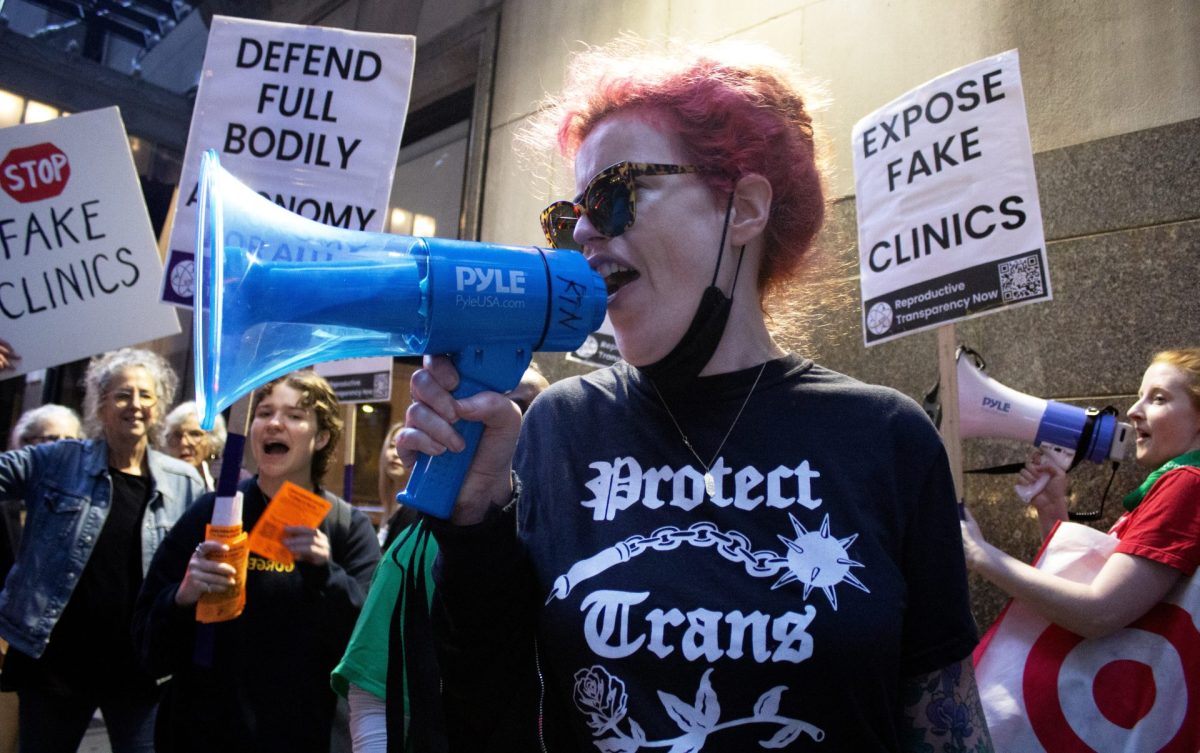 Nora Muhlemfeld and other abortion rights activists march outside a fundraiser for crisis pregnancy centers at the Union League Club in downtown Chicago Thursday, Sept. 28, 2023, which was also International Safe Abortion Day.