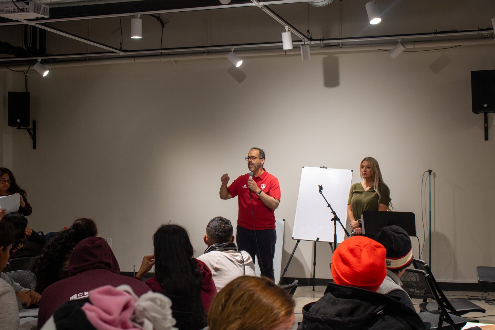 Lena Charles and Rogelio Silva teach English as a second language classes at Friendship Community Place on Thursday Oct. 12. These classes help migrants learn phrases they need to advocate for themselves.
