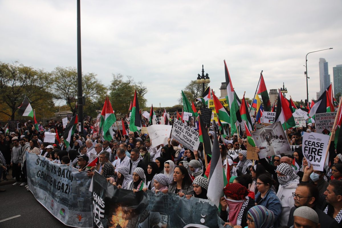 Protesters march at the Chicago Coalition for Justice in Palestine’s Stop the U.S. Backed Genocide against Gaza rally on Oct. 21, 2023, in Chicago.