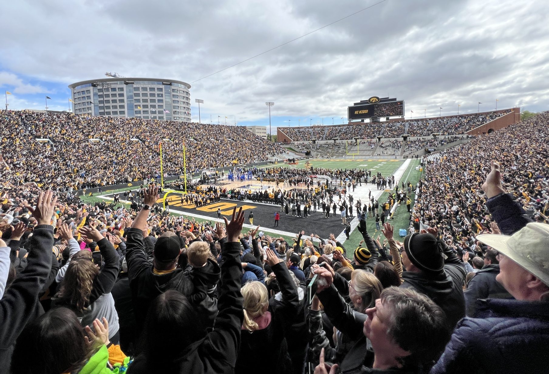 Fans gather for the DePaul-Iowa women’s charity basketball game at Kinnick Stadium in Iowa City, Iowa, on Sunday, Oct. 15, 2023. The outdoor game broke the record for attendance for a woman’s basketball game with 55,646 fans in attendance.