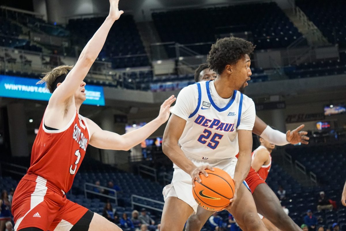 DePaul forward Jeremiah Oden drives to the baseline in DePauls matchup against South Dakota Wednesday, November 14, at Wintrust Arena.