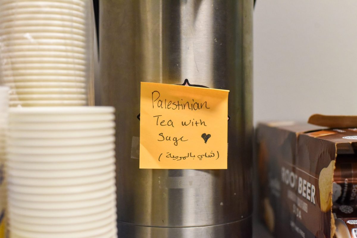 A jug of Palestinian tea sits on the snack table during the Winter Kickoff Event in Lincoln Park Tuesday Jan. 23, 2024. Palestinian tea is made with sage and boiling water. 