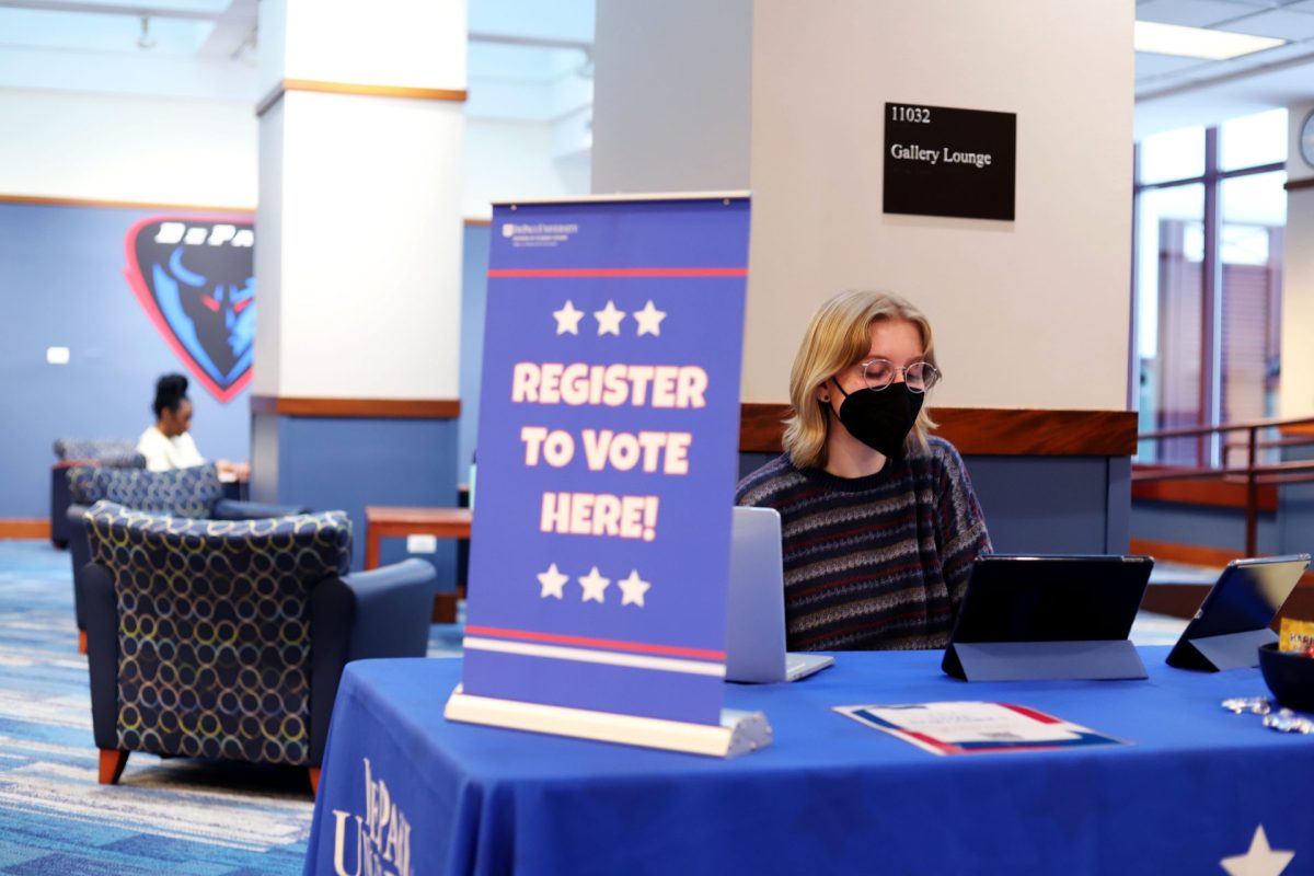 Ava Fischer, a senior political science student and DePaul voter engagement specialist, registers  students to vote in the DePaul Center on the Loop Campus Tuesday, Jan. 23, 2024. Fischer and others registered about 50 students for upcoming elections.
