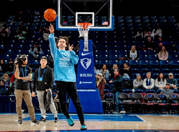 Connor Koy, DePaul sophomore, sinks a halfcourt shot at the DePaul Mens Basketball game against Creighton on Jan. 9, at Wintrust Arena.