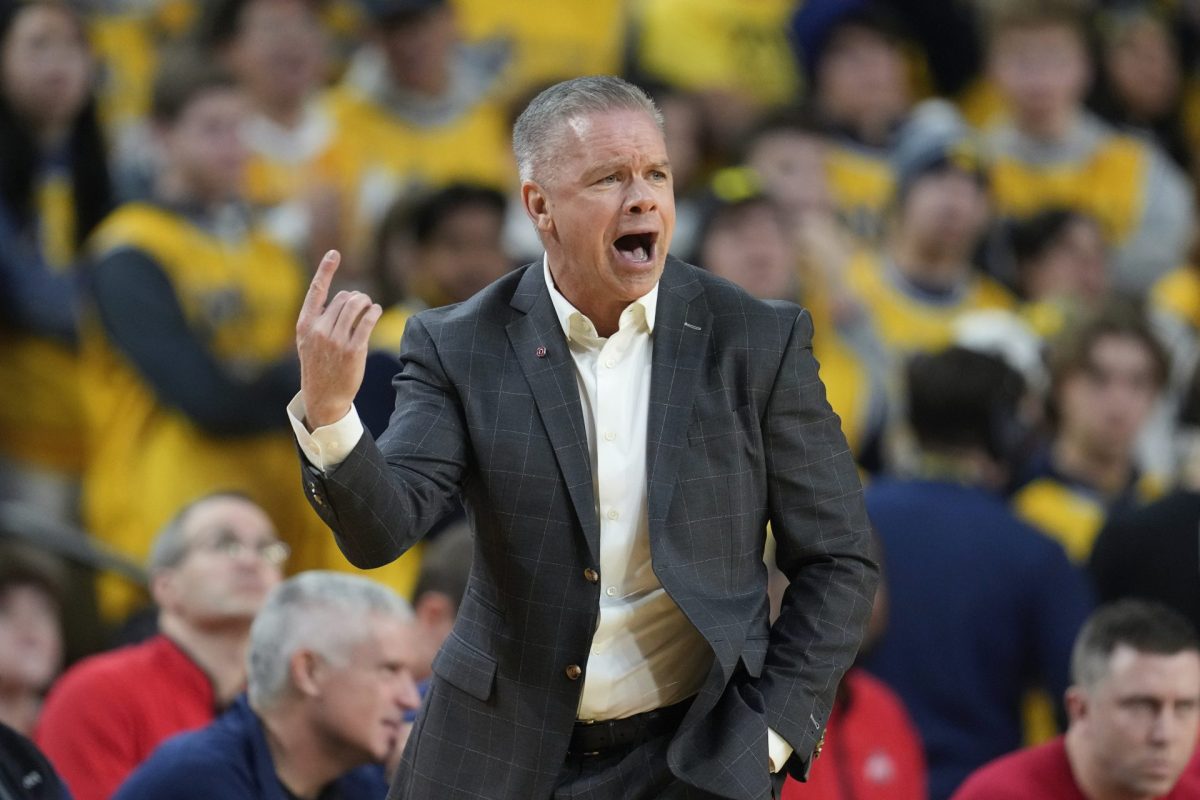 Ohio State head coach Chris Holtmann watches against Michigan in the first half of an NCAA college basketball game in Ann Arbor, Mich., Monday, Jan. 15, 2024. Holtmann will come to Chicago as DePauls head coach after seven seasons in Columbus. (AP Photo/Paul Sancya)