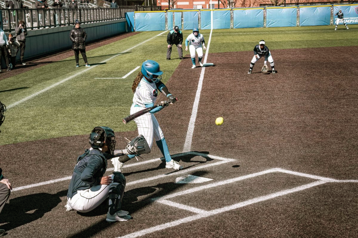 DePaul freshman Morgan Rogers swings at a pitch during a game against Georgetown Sunday, March 10, at Cacciatore Stadium in Lincoln Park. The Blue Demons won both games in a double-header Sunday after dropping the home opener on Saturday.