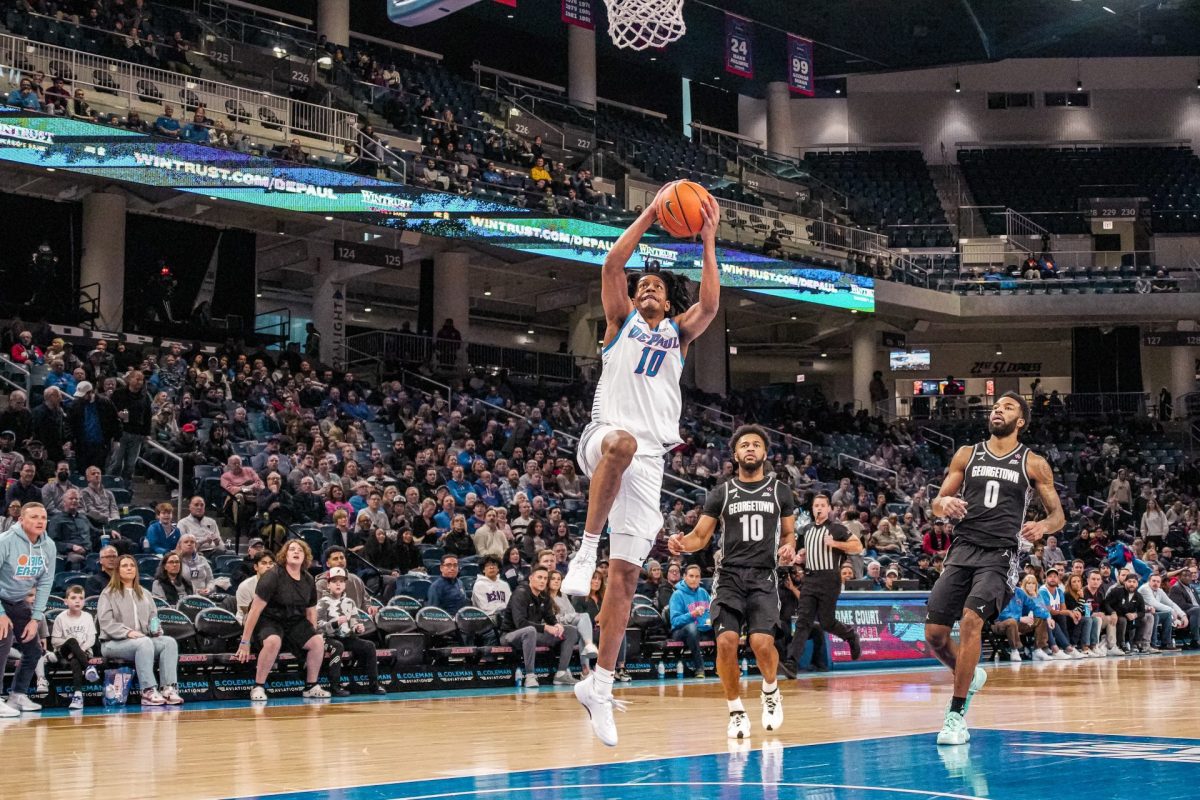 Guard+Jaden+Henley+goes+up+for+the+dunk+in+a+game+against+Georgetown+on+Saturday%2C+Feb.+24%2C+2024%2C+at+Wintrust+Arena.+Henley+finished+with+15+points.