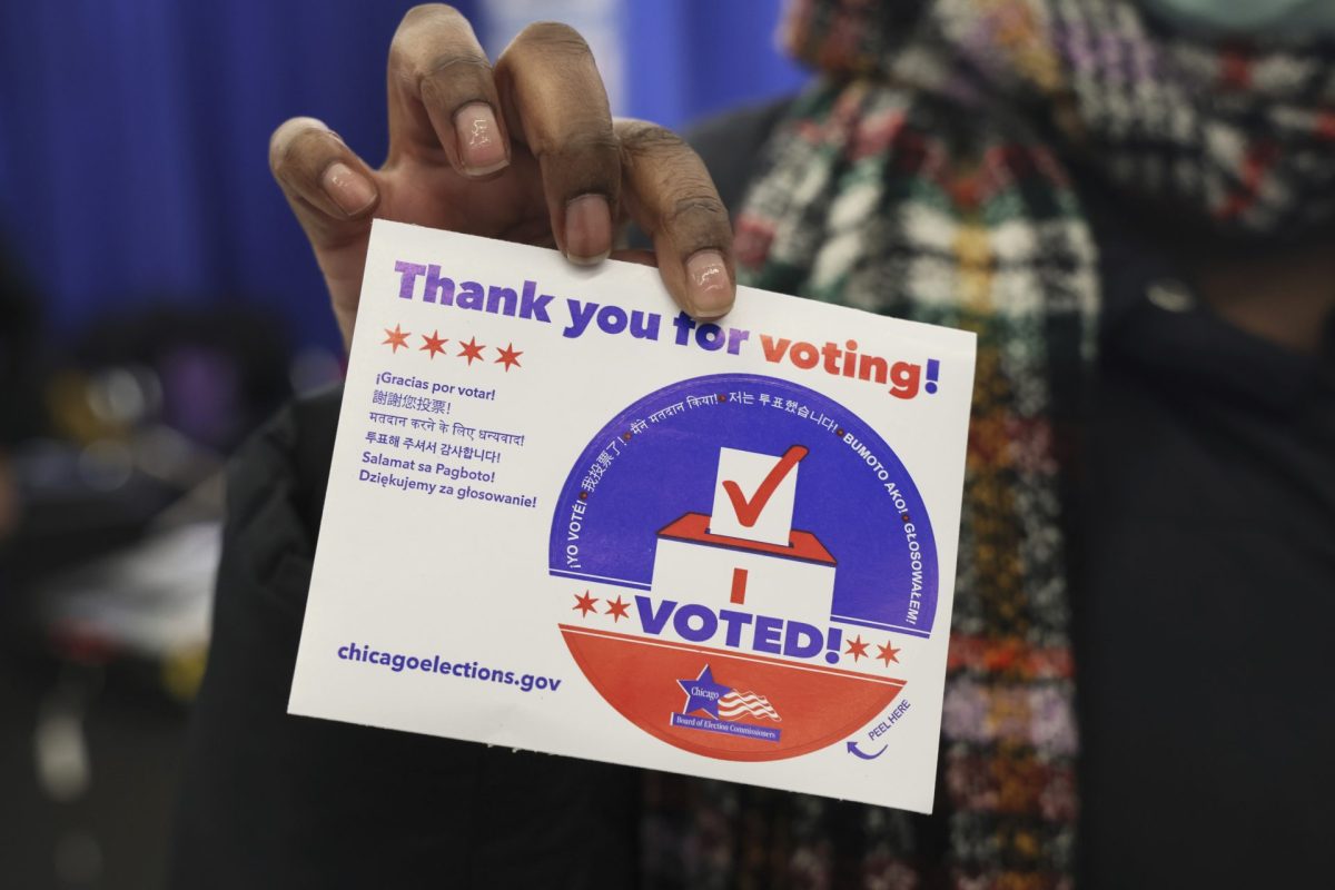 A+voter+shows+her+I+voted+sign+after+casting+her+ballot+in+Chicago%2C+Tuesday%2C+March+19%2C+2024.+Illinois+is+one+of+five+states+holding+presidential+primaries+as+President+Joe+Biden+and+former+President+Donald+Trump+continue+to+lock+up+support+around+the+country+after+becoming+their+parties+presumptive+nominees.+Voters+are+casting+ballots+Tuesday+in+Arizona%2C+Florida%2C+Illinois%2C+Kansas+and+Ohio.+%28AP+Photo%2FTeresa+Crawford%29