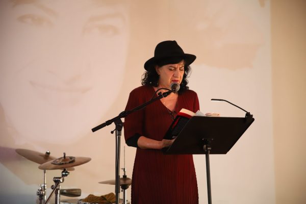Aurora Luque shares her poetry at the Poesia en Abril Festival from April 19, 2024 at the Co-Prosperity Cultural Center. She was the guest of honor at the event along with Nancy Morejon.