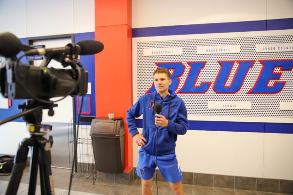 DePaul junior Sven Moser addresses the media after a practice Thursday, April 25, at the Sullivan Athletic Center, shortly after returning from the team's Big East championship victory in Cayce, South Carolina.