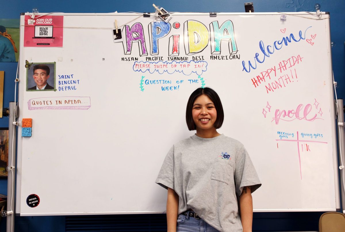Sabrina Salvador, Coordinator of the APIDA Cultural Center, poses in front of a whiteboard on Thursday, May 9, 2024. Graduating from undergrad in the Spring of 2021, Salvador would take over the role in October of 2022 while staying on as a graduate student.