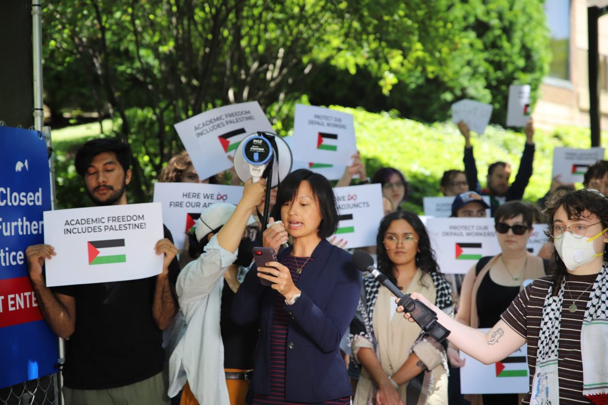 Anne dAquino, an adjunct instructor, speaks on Belden Avenue at a press conference on June, 6, 2024. Dr. dAquino was fired last month after  “the introduction of political matters into the class” which were “unrelated to the course.” 
