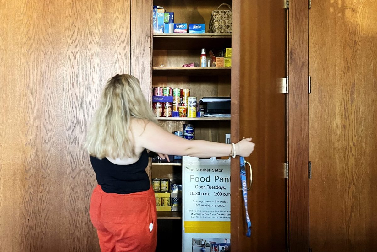 Outreach Coordinator Maeve Murphy prepares food donations at the Seton Food Pantry and Food Kitchen on Monday, Sept. 16, 2024. The kitchen always accepts donations from local businesses as well as from individuals.