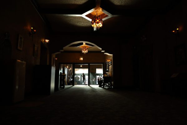 A customer waits in the entryway of the Music Box Theater on Thursday, Sept. 19, 2024. The Theater holds daily showings of old and new films.